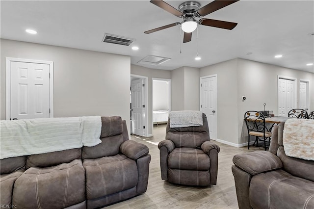 living room with ceiling fan