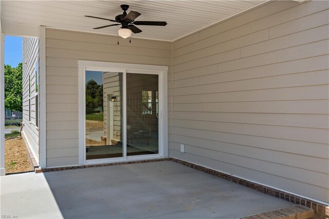 view of patio featuring ceiling fan