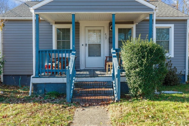 entrance to property with a porch