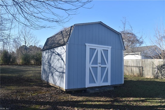 view of outbuilding with a lawn