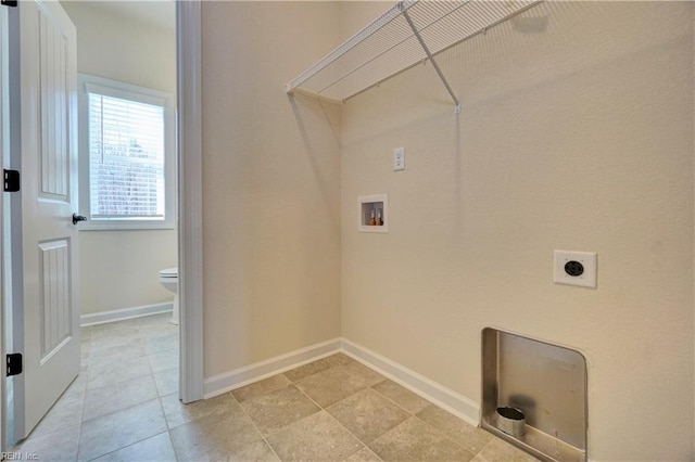 laundry area with hookup for an electric dryer and hookup for a washing machine