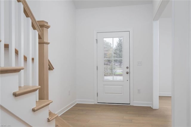 entrance foyer with light hardwood / wood-style flooring