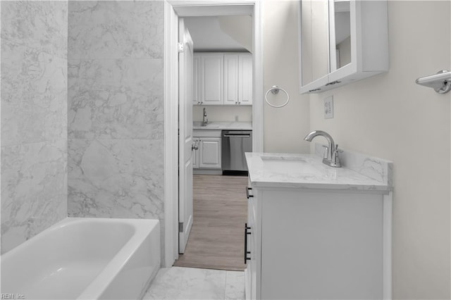 bathroom with vanity and  shower combination