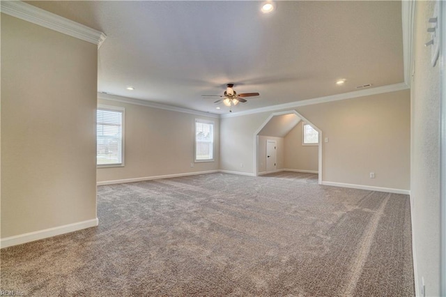 bonus room with carpet flooring and ceiling fan