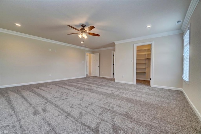 interior space with crown molding and ceiling fan