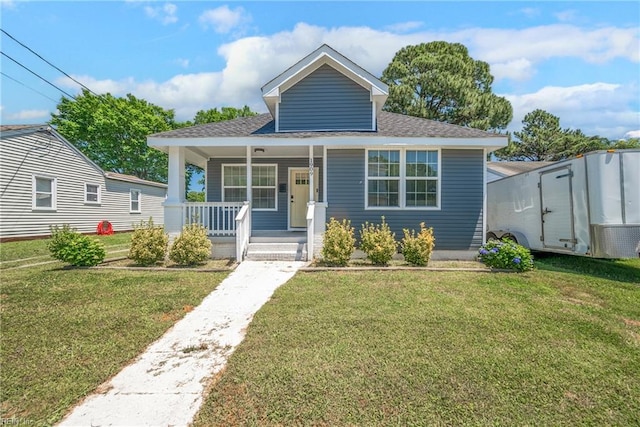 bungalow-style house featuring a front yard and a porch