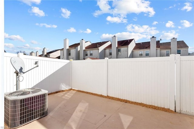 view of patio with central AC