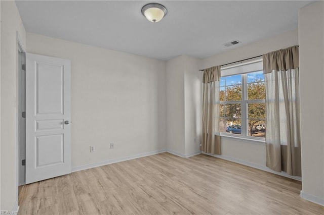 empty room featuring light hardwood / wood-style flooring