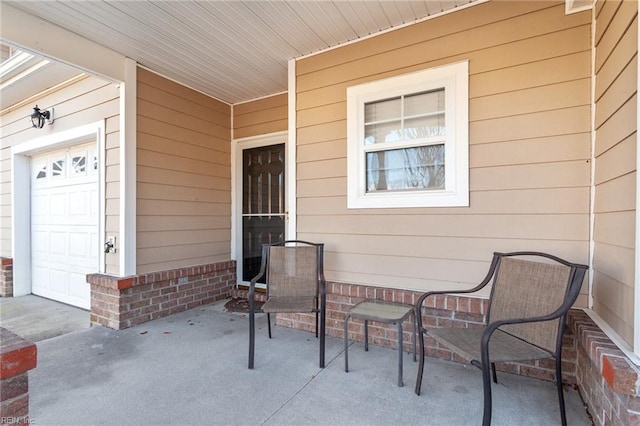 view of patio / terrace with a garage