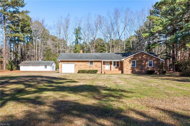 single story home featuring a front yard