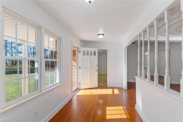 corridor featuring hardwood / wood-style flooring