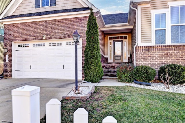 exterior space with a lawn and a garage