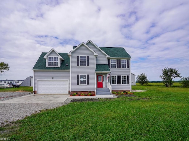 view of front facade with a garage and a front lawn