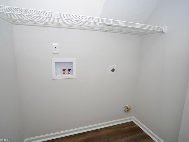 washroom featuring hookup for an electric dryer, dark hardwood / wood-style floors, and washer hookup