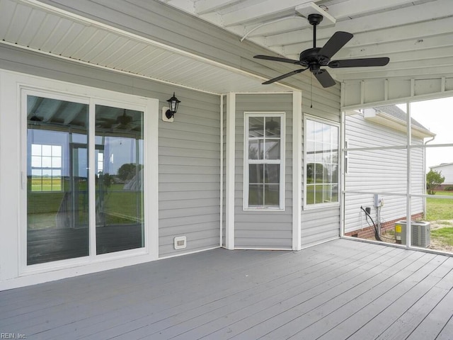 wooden terrace with ceiling fan and cooling unit