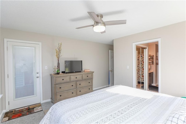 carpeted bedroom featuring ensuite bathroom and ceiling fan