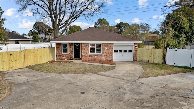 single story home featuring a garage