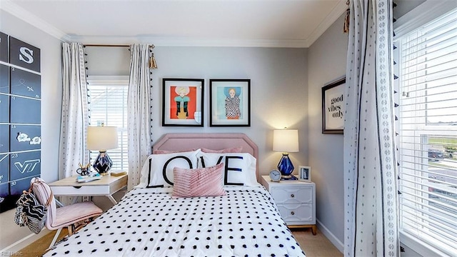 bedroom with crown molding and carpet