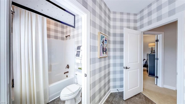 bathroom with shower / bath combination with curtain and toilet