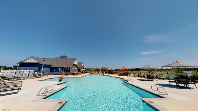 view of pool featuring a patio