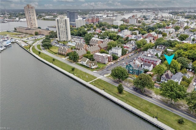 birds eye view of property featuring a water view