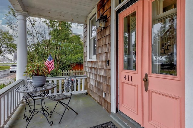 doorway to property featuring a porch