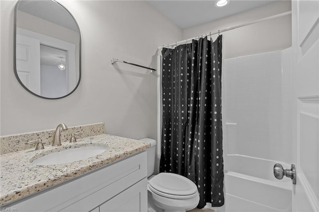 full bathroom with shower / tub combo, vanity, and toilet