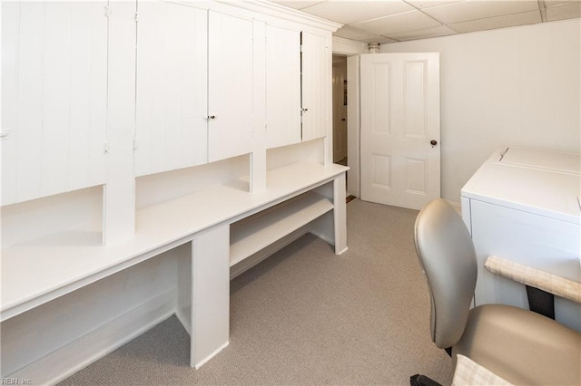 home office with independent washer and dryer and light colored carpet