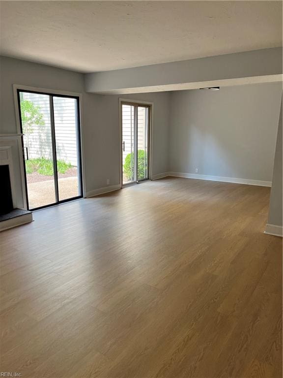 unfurnished room featuring light hardwood / wood-style flooring