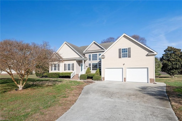 view of front of home featuring a garage and a front yard