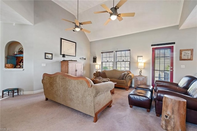 carpeted living room with vaulted ceiling