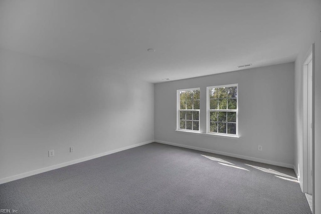 unfurnished room featuring carpet floors