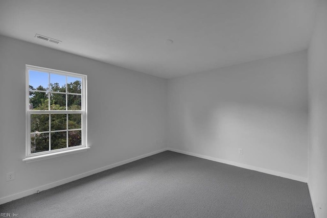 unfurnished room featuring carpet floors