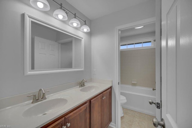 full bathroom featuring vanity, bathing tub / shower combination, and toilet