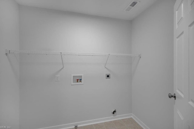 washroom featuring hookup for an electric dryer and hookup for a washing machine