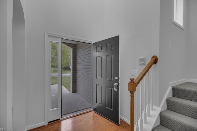 foyer entrance with light hardwood / wood-style flooring