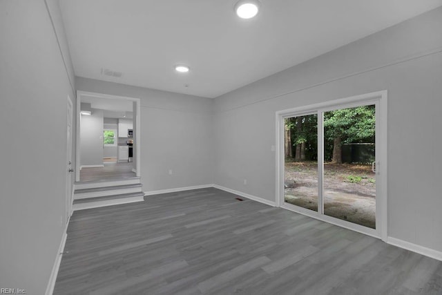 empty room with wood-type flooring