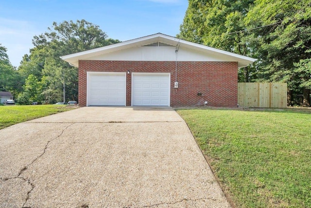 garage featuring a yard