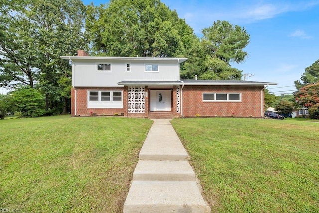 front facade with a front yard