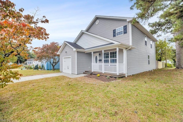 view of front of house with a porch, a garage, and a front yard