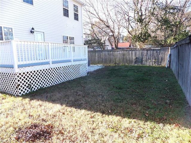 view of yard with a deck