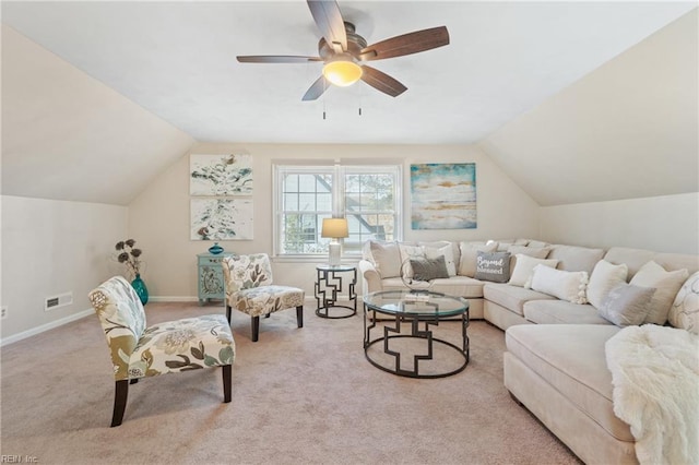 carpeted living room featuring vaulted ceiling and ceiling fan