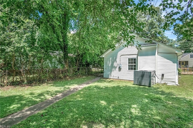 view of yard featuring central AC