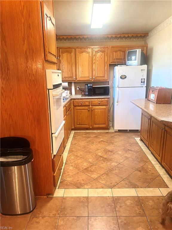 kitchen featuring white appliances