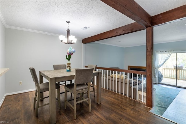 dining space featuring crown molding, dark hardwood / wood-style flooring, beam ceiling, a textured ceiling, and an inviting chandelier