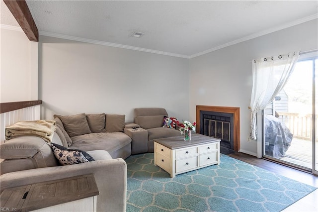 living room with crown molding and dark hardwood / wood-style floors