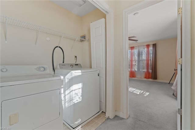 laundry area with light carpet, ceiling fan, and independent washer and dryer