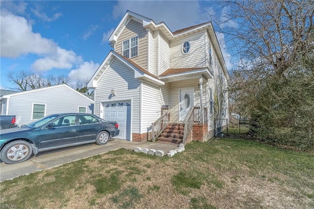 view of front of house featuring a garage and a front lawn