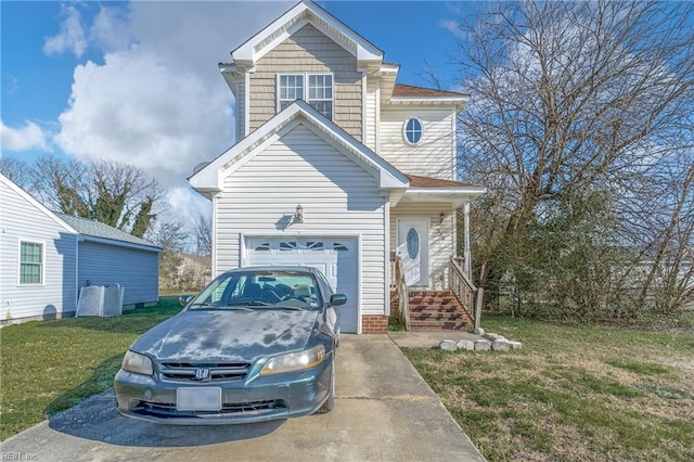 view of front of home featuring a garage and a front lawn