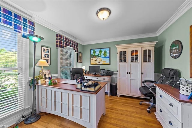 home office featuring ornamental molding and light wood-type flooring